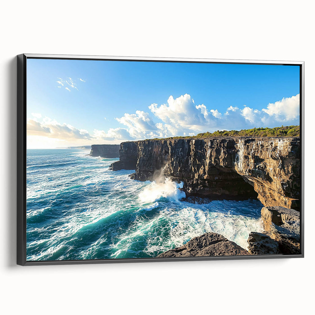 Framed canvas artwork depicting a scenic cliff landscape, showcasing vibrant hues of blue and green with a sleek black frame, perfect for home decor.