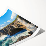Vibrant rolled landscape canvas print showcasing dramatic cliffs and serene ocean waves, expertly packaged in a durable tube for safe shipping and display.