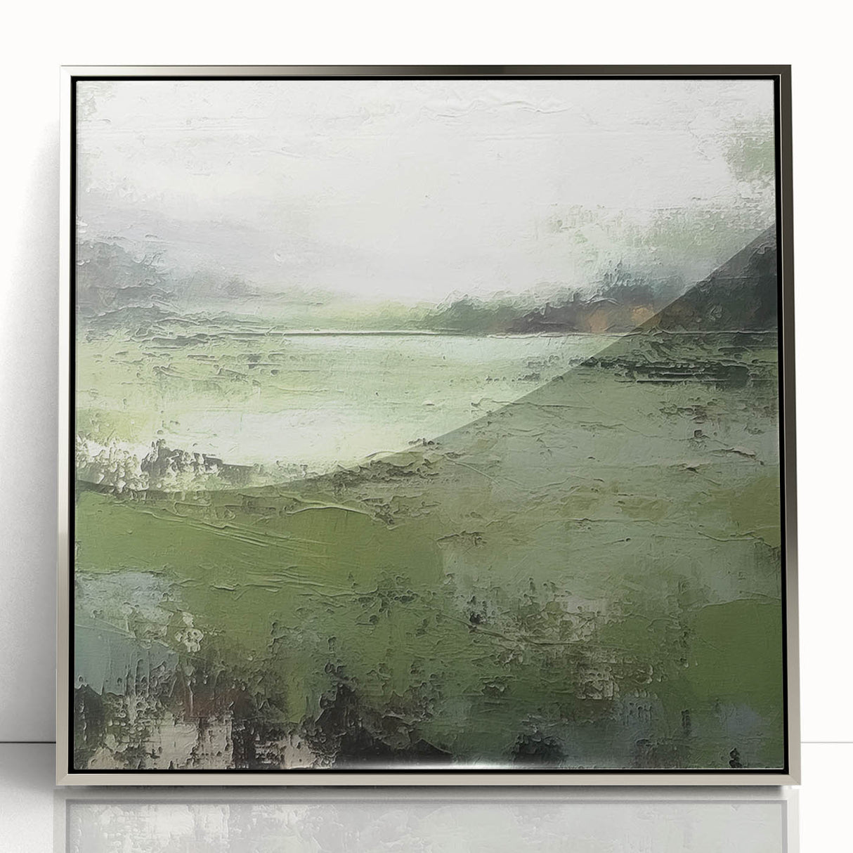 Framed abstract landscape wall art in a sleek silver frame, showcasing vibrant colors and dynamic shapes, perfect for modern home décor and artistic flair.