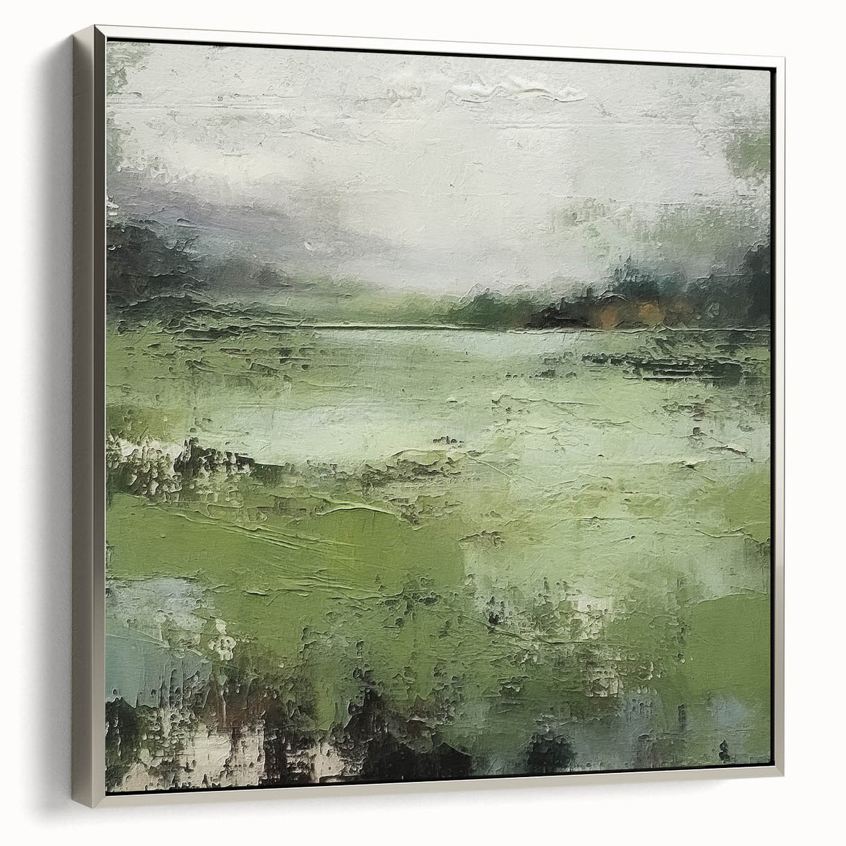 Framed canvas wall art featuring an abstract landscape design in muted tones, showcasing a silver frame and side view perspective to highlight its sleek style. Ideal for modern home decor, this artwork adds elegance and depth to any room.