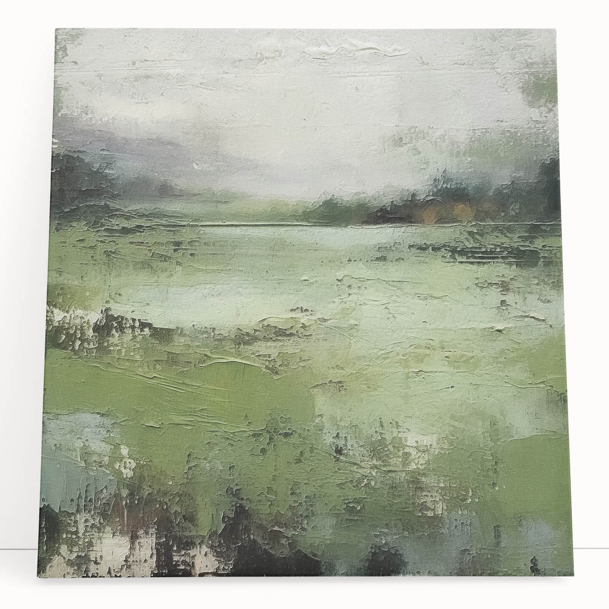 Abstract landscape wall art on stretched canvas, showcasing vibrant colors and fluid shapes, leaning against a neutral-toned wall, perfect for modern decor.