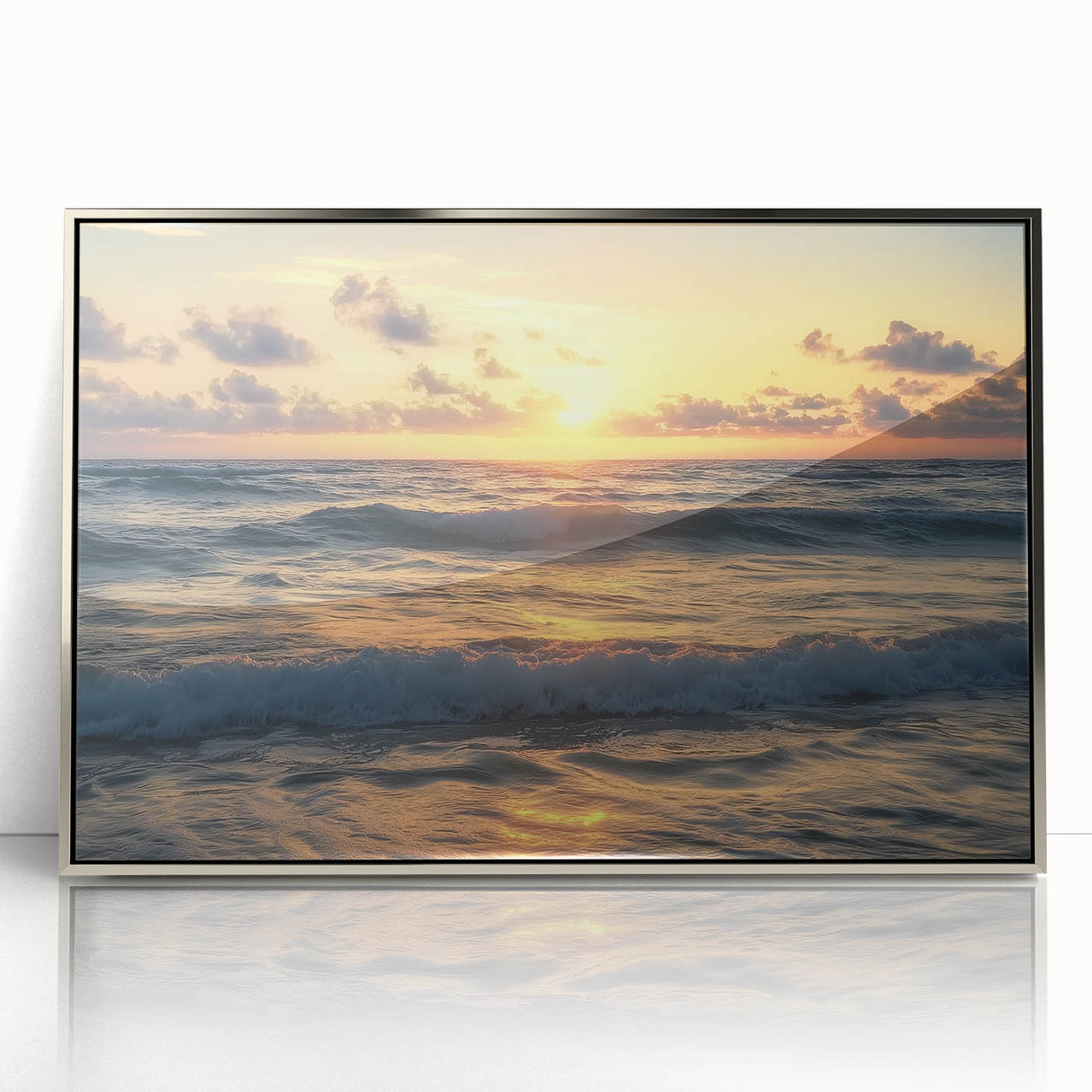 Framed acrylic artwork showcasing a serene beach landscape with soft waves and a blue sky, featuring silver accents for a modern touch. Perfect for coastal home decor.