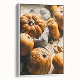 Vintage poster art of an autumnal scene with colorful leaves on a white framed canvas, ideal for living room decor.