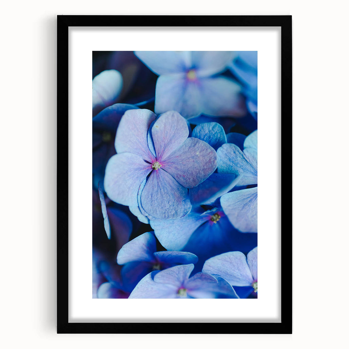 Extra large abstract art print featuring vibrant, colorful textures on a framed black canvas, ideal for living room decor.