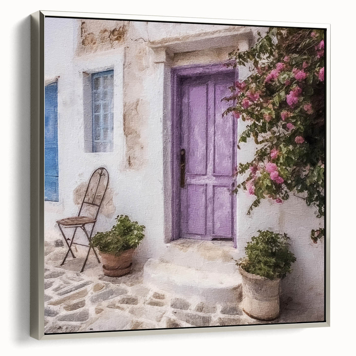 Framed canvas depicting a vintage black door in a colorful Greek landscape, ideal for adding character to living room decor.