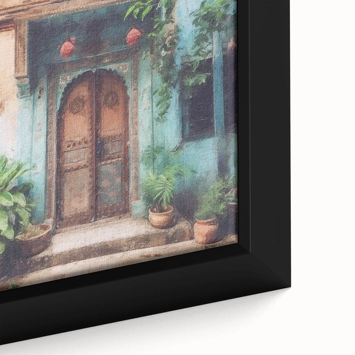 Close-up of a black framed canvas featuring a colorful, textured depiction of an ornate Indian door.