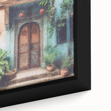 Close-up of a black framed canvas featuring a colorful, textured depiction of an ornate Indian door.