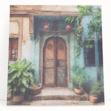 Black and white photograph of an ornate Indian door on stretched canvas.