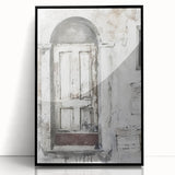 Framed acrylic print of a rustic Italian door in muted earth tones.
