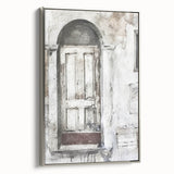 Framed canvas featuring a rustic Italian door in muted earth tones, ideal for adding a vintage touch to any living space.