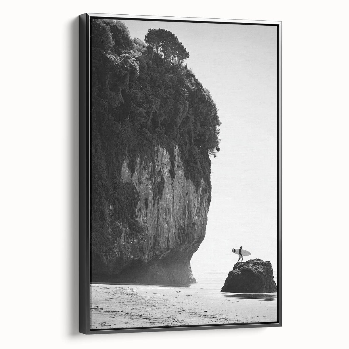 Framed landscape canvas art showcasing a serene black and white mountain scene, featuring a sleek black frame and ideal for modern home decor.