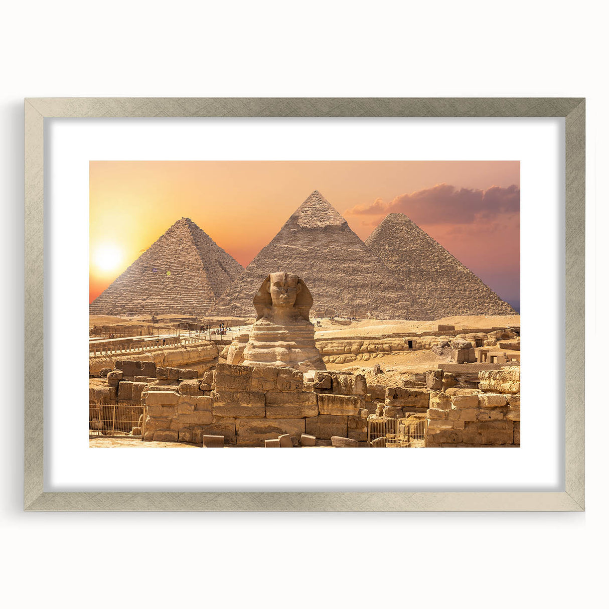 Abstract art print of Egyptian scenery in muted earth tones on a framed silver canvas, ideal for dining room decor.