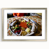 Abstract art print depicting Ethiopian scenery in earth tones, silver-framed with mat, suitable for dining room decor.