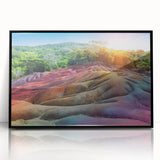 Large abstract wall art depicting a scenic Mauritius landscape in vibrant colors, framed in black acrylic.