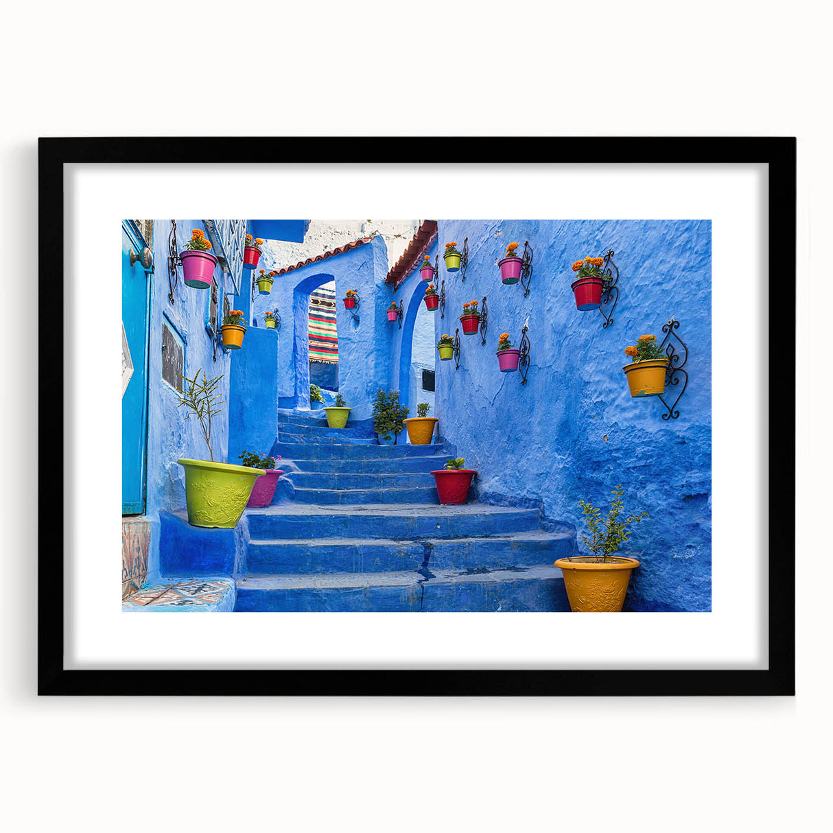 Extra large abstract art print featuring a colorful, textured Moroccan landscape on a black framed canvas.