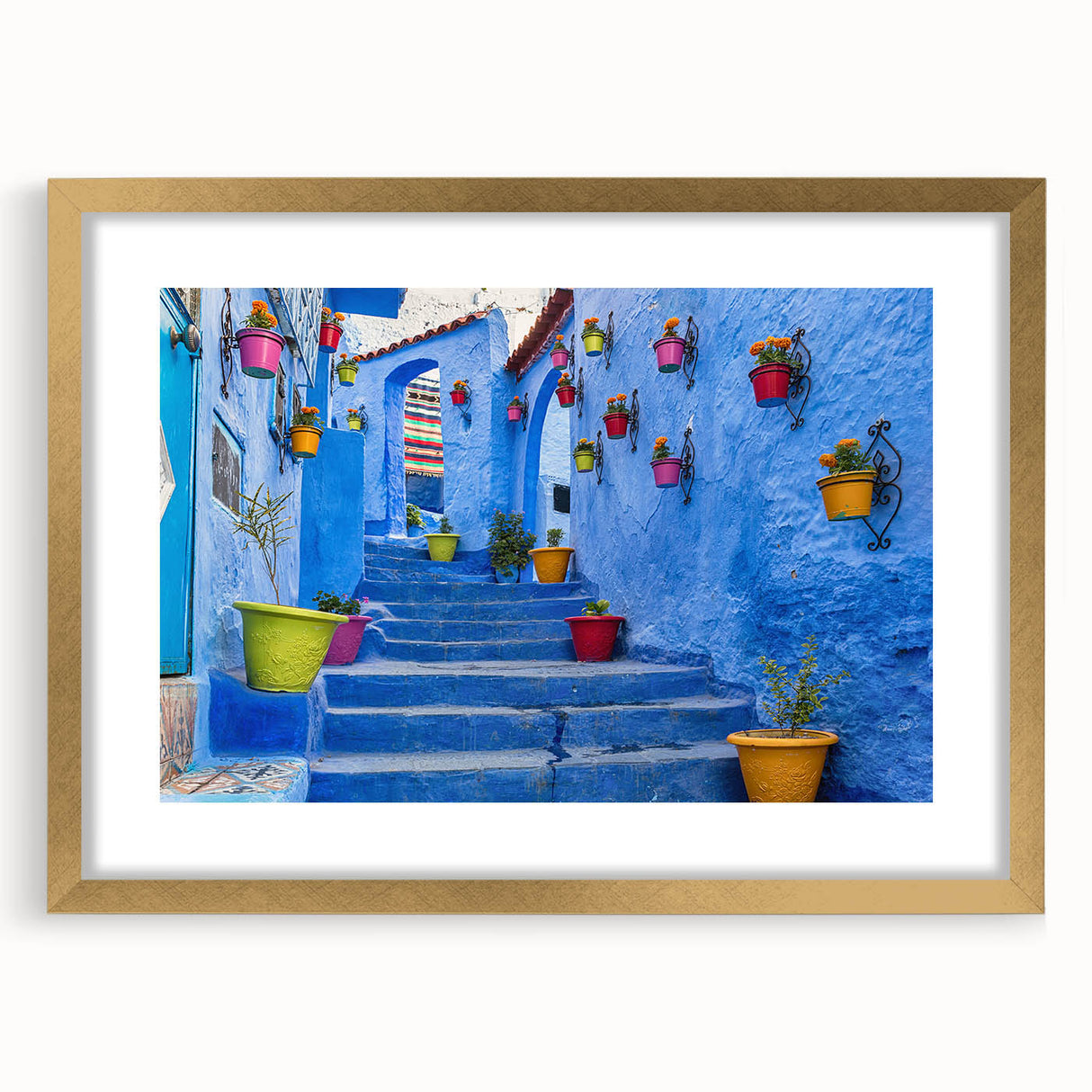 Textured abstract art print of a Moroccan landscape in earth tones on a framed canvas, suitable for bedroom decor.