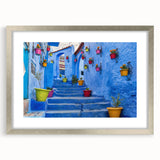 Abstract art print depicting a Moroccan landscape in muted earth tones on a framed canvas, suitable for dining room decor.