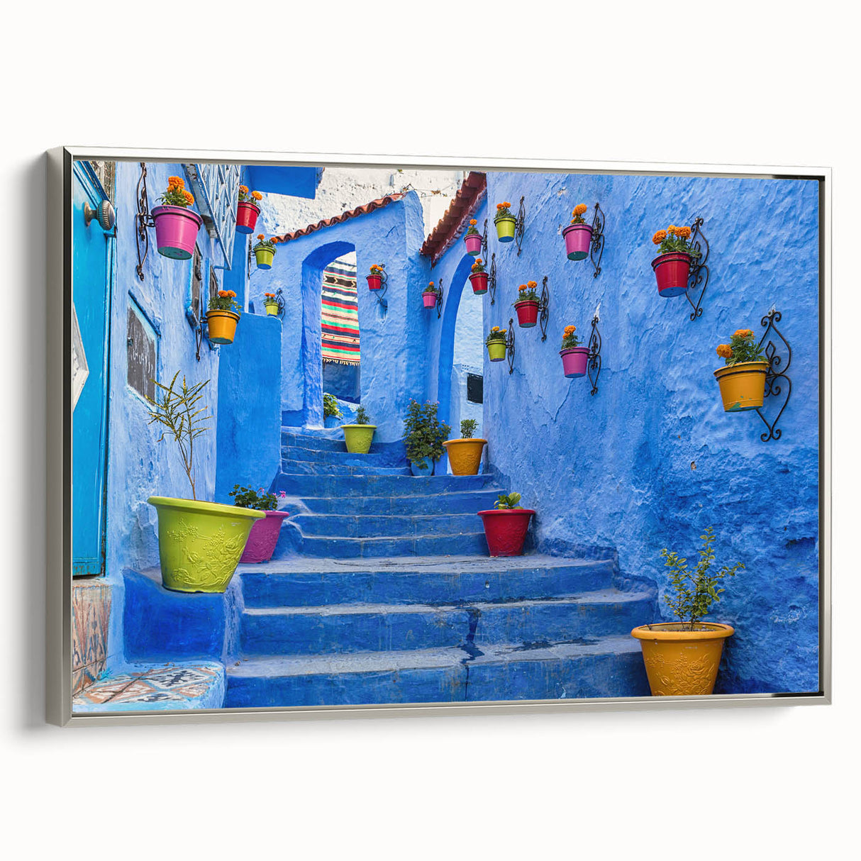 Vintage poster art of a Moroccan landscape on framed canvas, featuring vibrant colors.