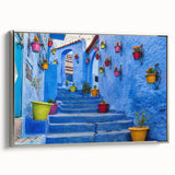 Vintage poster art of a Moroccan landscape on framed canvas, featuring vibrant colors.