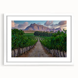 Abstract art print depicting a stylized South African landscape in earth tones on a white framed canvas.