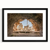 Extra large abstract art print of a colorful Tunisian landscape, textured on a black framed canvas.