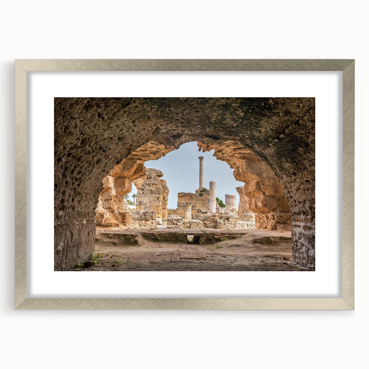 Textured abstract art print depicting a Tunisian landscape in earthy tones on a framed canvas, suitable for bedroom art.