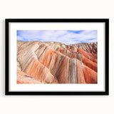 Extra large abstract art print of a vibrant, colorful Asian landscape on textured canvas, framed in black.