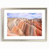Textured art of abstract scenery in muted earth tones on a framed canvas, suitable for bedroom decor.
