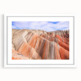 Abstract art print featuring a blend of muted earth tones on a framed canvas, suitable for dining room decor.