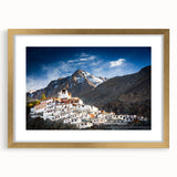 Extra large textured abstract art print of a Tibetan landscape in muted gold and earth tones, framed with mat.