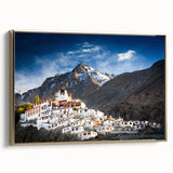 Framed canvas of a vintage-style Tibetan landscape in gold and black, ideal for bedroom wall art.