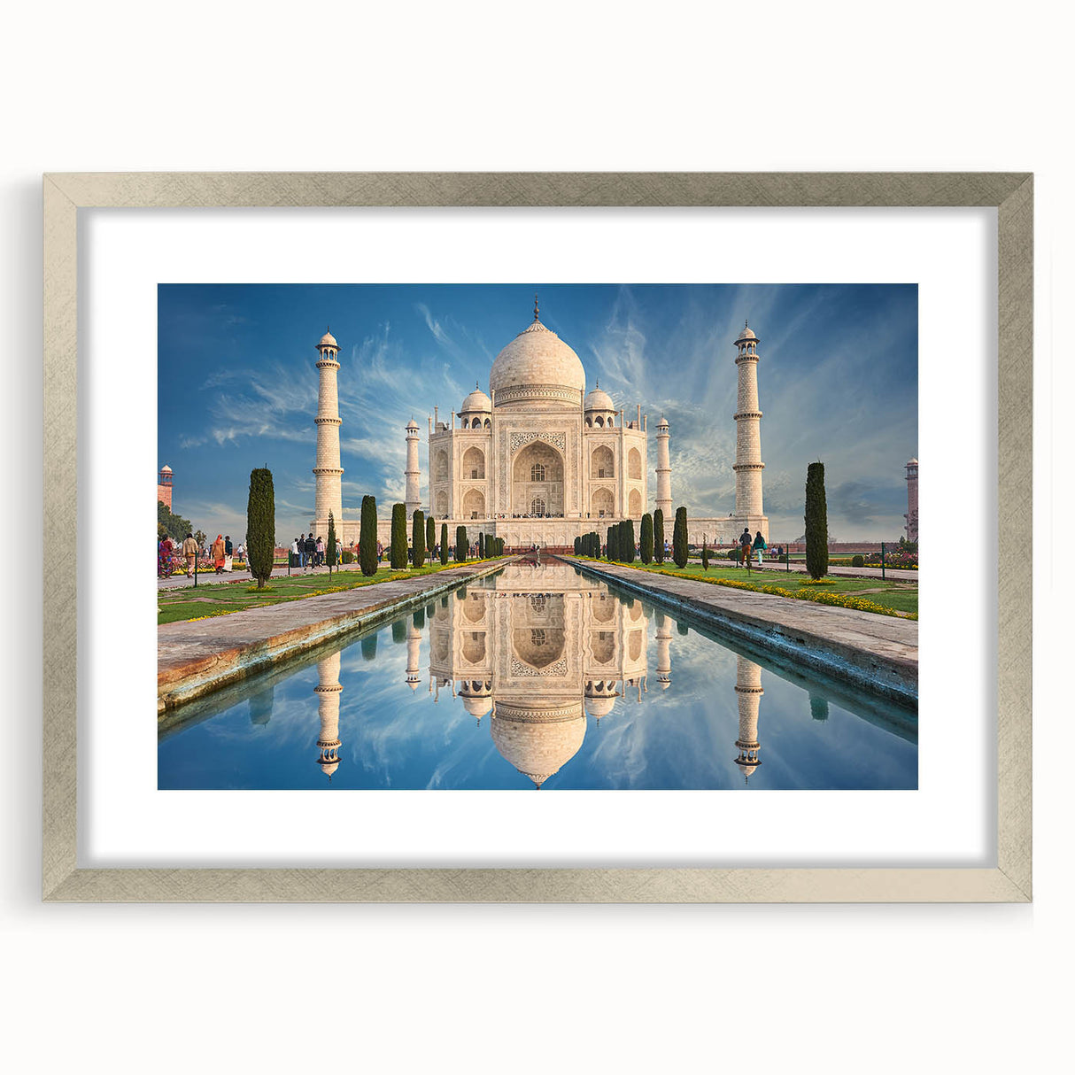Textured abstract art print of a serene Indian landscape in earth tones, framed with a silver mat, suitable for bedroom art.