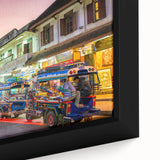 Extra large framed canvas featuring a textured black wall art scene of Laos, highlighted with colorful accents.