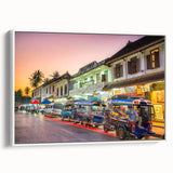 Vintage poster art of a Laos scenery in vibrant colors on a framed canvas, ideal for living room decor.