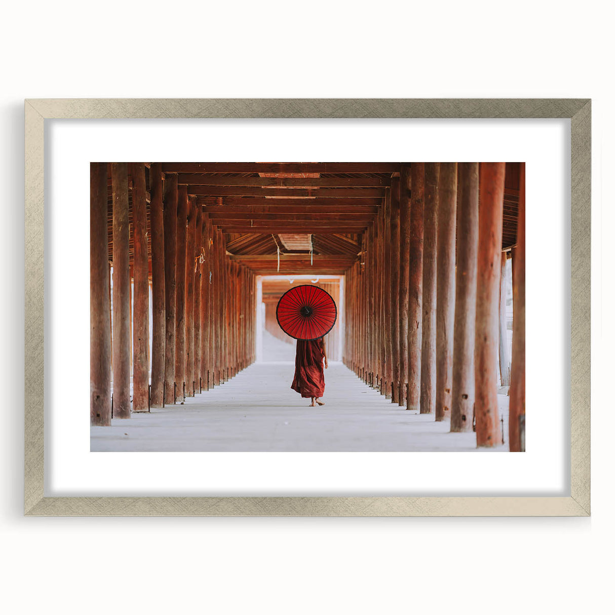 Textured abstract art print of a Myanmar landscape in silver frame, with muted earth tones, ideal for bedroom art.
