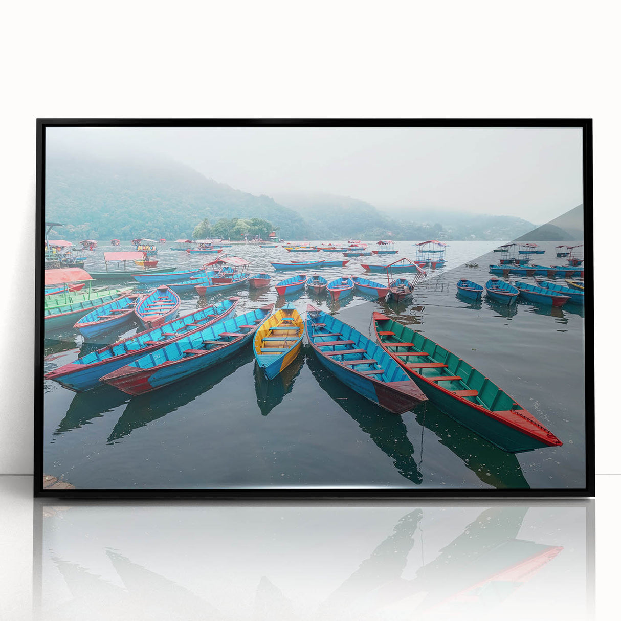 Large abstract wall art depicting a stylized Nepalese landscape in muted earth tones, framed in black acrylic.