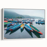 Vintage poster art of a Nepalese landscape on a framed canvas, featuring colorful art with black accents.