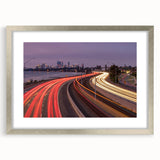 Abstract art print of Perth skyline in muted gray and blue tones on a framed silver mat.