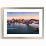 Extra large abstract art print of Sydney scenery in silver frame, featuring textured gray and blue tones.