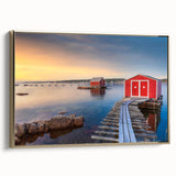 Framed canvas featuring a vintage-style landscape painting of Newfoundland with muted gold and black tones.