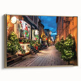 Framed canvas depicting a vintage-style landscape painting of Quebec, featuring muted earth tones.