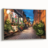 Framed canvas featuring a vintage-style landscape art painting of Quebec, with colorful hues and black accents.