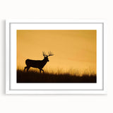 Abstract art print of Saskatchewan scenery in muted earth tones on a white-framed mat.