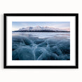 Extra large colorful art print of abstract Yukon scenery in textured style, framed in black, ideal for living room decor.