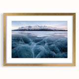 Extra large abstract art print of Yukon scenery in gold frame with mat, featuring textured brush strokes in earth tones.