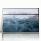 Mid-century modernist art depicting Yukon scenery in muted blue and green tones, acrylic print in silver frame.