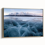 Framed canvas featuring a vintage-style landscape painting of Yukon scenery in muted gold and black tones.