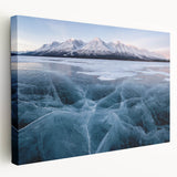 Snow-covered Yukon landscape on large stretched canvas, featuring muted white and blue tones, suitable for kitchen wall art.