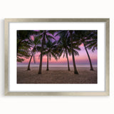 Extra large abstract art print depicting Caribbean scenery in vibrant blue and green hues on a silver-framed canvas.