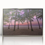 Large art print of a Caribbean beach scene in muted blue and green tones, framed in silver acrylic.